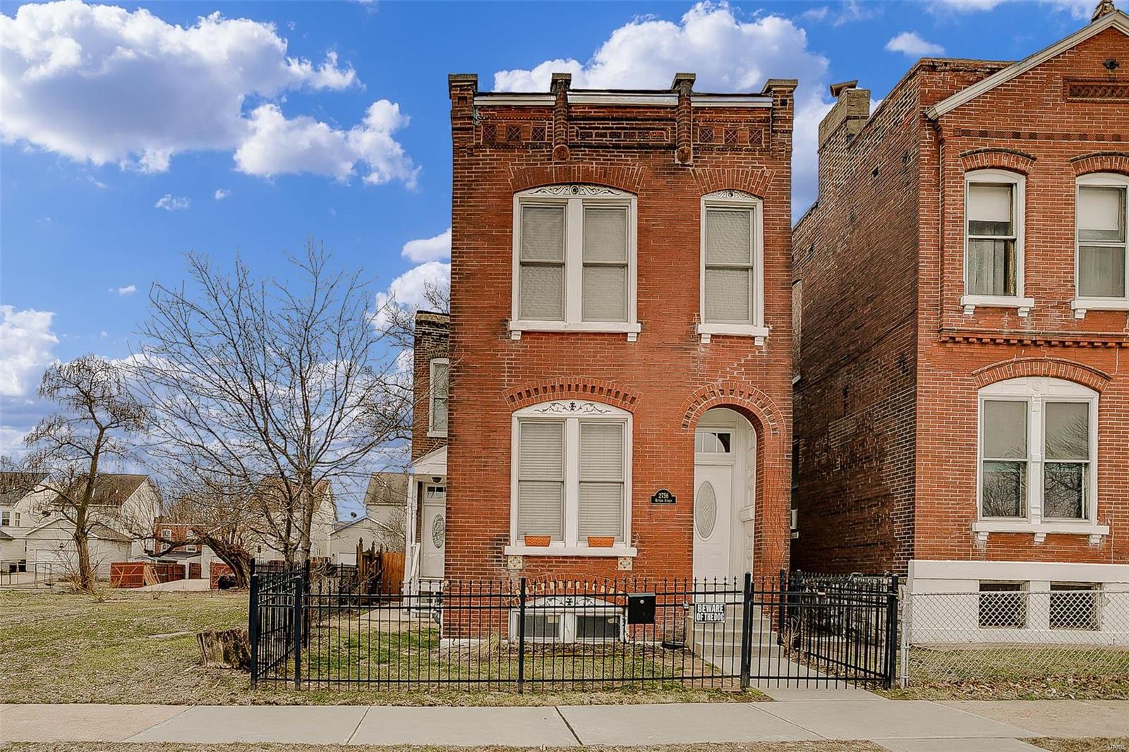 Welcome home to this spacious Historic home with a double lot, in a prime St. Louis City location!  This beauty offers newly (and beautifully) refinished hardwood floors, fresh paint throughout, brand new stainless steel appliances, and a HUGE master bedroom.  On the main floor, you will find a half bath and a completely open concept floor plan, ready for the new owner to get creative with their choice of style.  Upstairs are two large bedrooms, a spacious bathroom and a laundry closet conveniently located between the bedrooms for easy access. There is also a full basement, currently unfinished but could be completed to add additional living space in this already spacious city home. Located on a great street, and with brand new homes going up, this would be a great investment for the savvy homeowner.