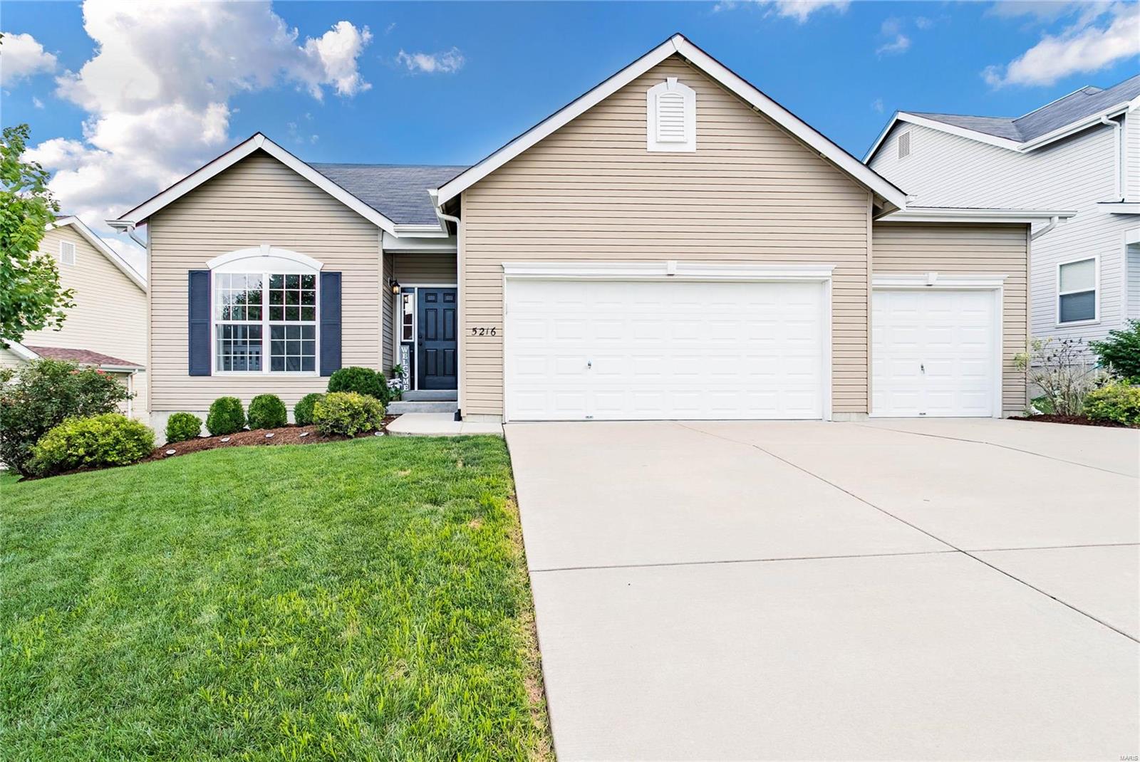 Welcome home to this custom built ranch with all the extras! One of the biggest lots on the street you also back to trees and have an amazing flat lot. The enormous deck with built in pergola is freshly power washed and stained. The whole garage is extended by 2 extra feet on all bays and has overhead storage. You walk into the long inviting entryway that takes you to the vaulted great room with gas fireplace. New engineered wood through the main living area and master bedroom. The back of the house is extend FOUR feet from the typical floor plan! Your 42" white kitchen cabinets pop with the wood floors and stainless steel appliances. Fresh paint, dark bronze hardware, lighting package and 9 ft ceilings throughout. The basement runs the whole home and is ready for your custom finish! Bathroom rough in, lookout windows and egress window for 4th bedroom. Subdivision pool, basketball and tennis courts for family fun!! This one will go fast!