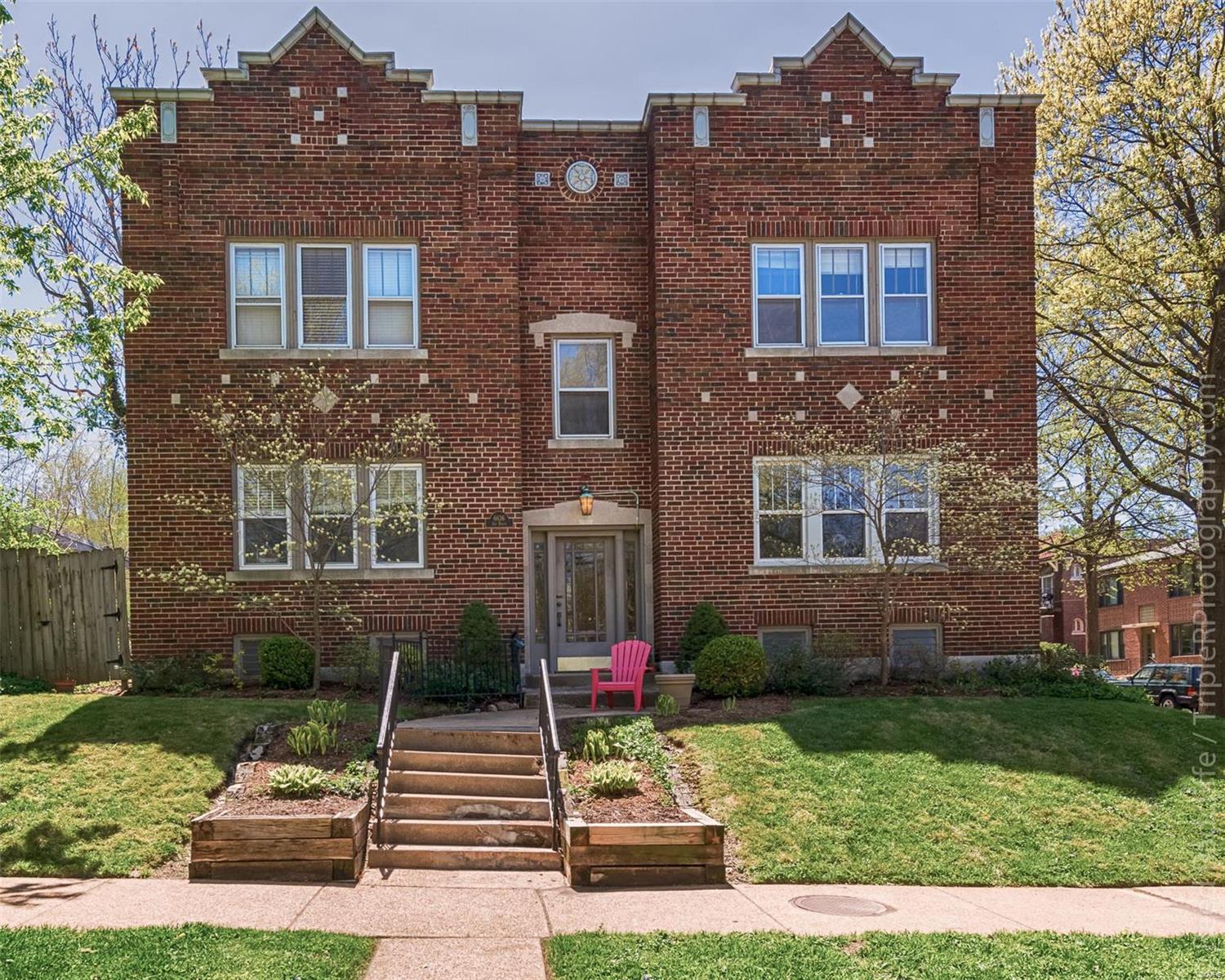 This stylish & spacious Clayton condominium lives large with over 1300 sq ft. to enjoy. The glowing hardwood floors and natural light flow throughout the living spaces from the bonus living area into the formal living and dining rooms. Other features include a decorative fireplace with brick surround and mantle, crown molding, and mounted wall sconces. The kitchen boasts granite counters, glass front top cabinets, high end, stainless steel appliances and a large breakfast room. Relax in the limestone Jacuzzi tub in the spa like full bath. Further amenities of this two bedroom, 1 full bath condominium include a stainless refrigerator, washer & dryer, tremendous storage and assigned off-street parking. If you're looking for top-rated Clayton Schools, the feel of the DeMun neighborhood-with its restaurants, cafes, shops and near Washington University, this home is for you! Low condo fees ($175/mo). Additional Rooms: Sun Room Location: Corner Location