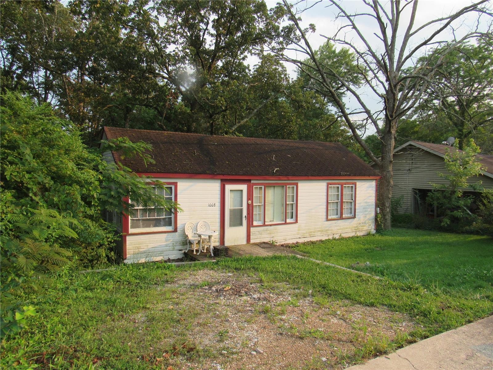 FIXER UPPER and INCREDIBLE OPPORTUNITY!! This home is priced for someone to make a profit!!!! A simple 3 room layout. But the HIGHLIGHT is the double lot, so much can be done with this beautiful yard. Who wants to flip this house???