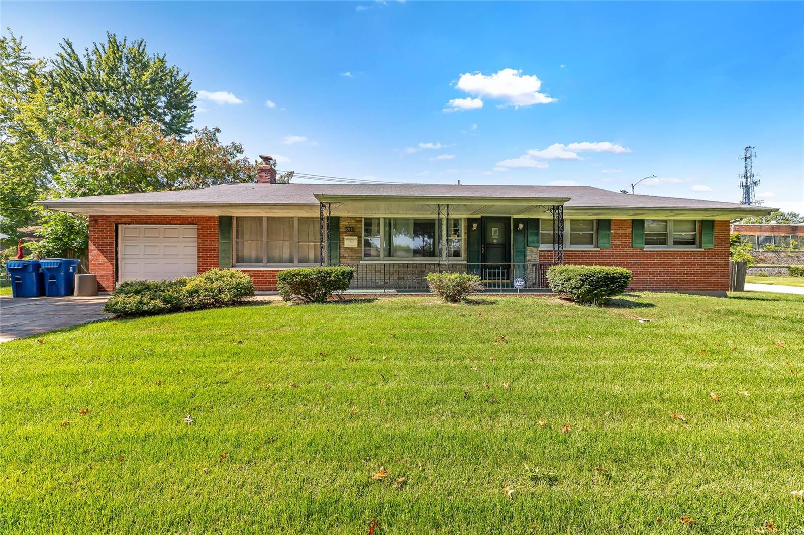 Darling,well cared for one level living at its finest! This property sits on a large lot & offers a spacious layout. As you pull
up notice the brick elevation on front side of home & cozy covered porch! You will find a spacious living room & separate family room- large kitchen w lots of natural light, & 3 generously sized bedrooms in the home. A back patio offers a shaded retreat after a long day of work where you can enjoy the St. Louis fall without the bugs (screened in!) Centrally located, bursting with potential, & well maintained!! Welcome Home