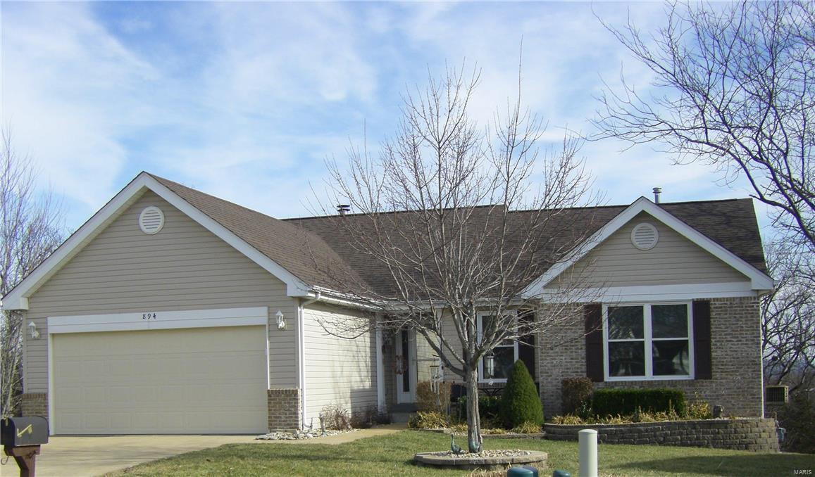 Atrium Ranch with 5 bedrooms!  The main floor of this beautiful home includes, main floor laundry, cathedral ceilings, beautiful lighting, quartz countertops in kitchen, 3 bedrooms and 2 full bathrooms.  Finished lower level boasts family room and wet bar, 2 bedrooms and one full bath.  Additional storage room/hobby area and walkout. Located near shopping, schools, quick access to I-44 and easy commute to St. Louis.