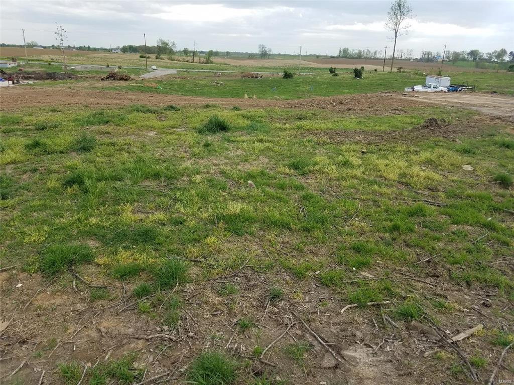 Great building lot in city limits. All city utilities available.