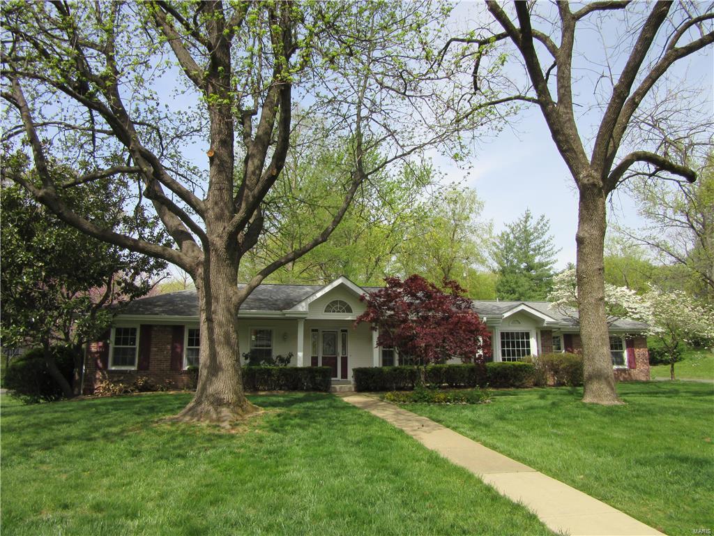 Don't MISS OUT Come and see this splendid updated mid century ranch in LADUE schools.  Spacious, with all refurbished wood floors, freshly painted and new insulated windows - MOVE IN READY.  Open living room/dining room, great natural light with large windows and recessed lighting. The kitchen sports all new appliances, and granite counter tops with a breakfast bar.  Kitchen and family room open to a lovely back yard great flow for entertaining and bringing the outdoors into this sun-filled home.  Family room is the center of this gorgeous home with a stone gas fireplace and vaulted ceilings.  The master is a gracious size with an updated bathroom and multiple closets.  The two bedrooms share an updated bath with granite top and full tub/shower.  The two car garage is connected with direct kitchen access. The lower level is prime for expansion into multiple rooms. The entire house has a new feel.  Great location close to all major thoroughfares and in the sought after Ladue Schools.