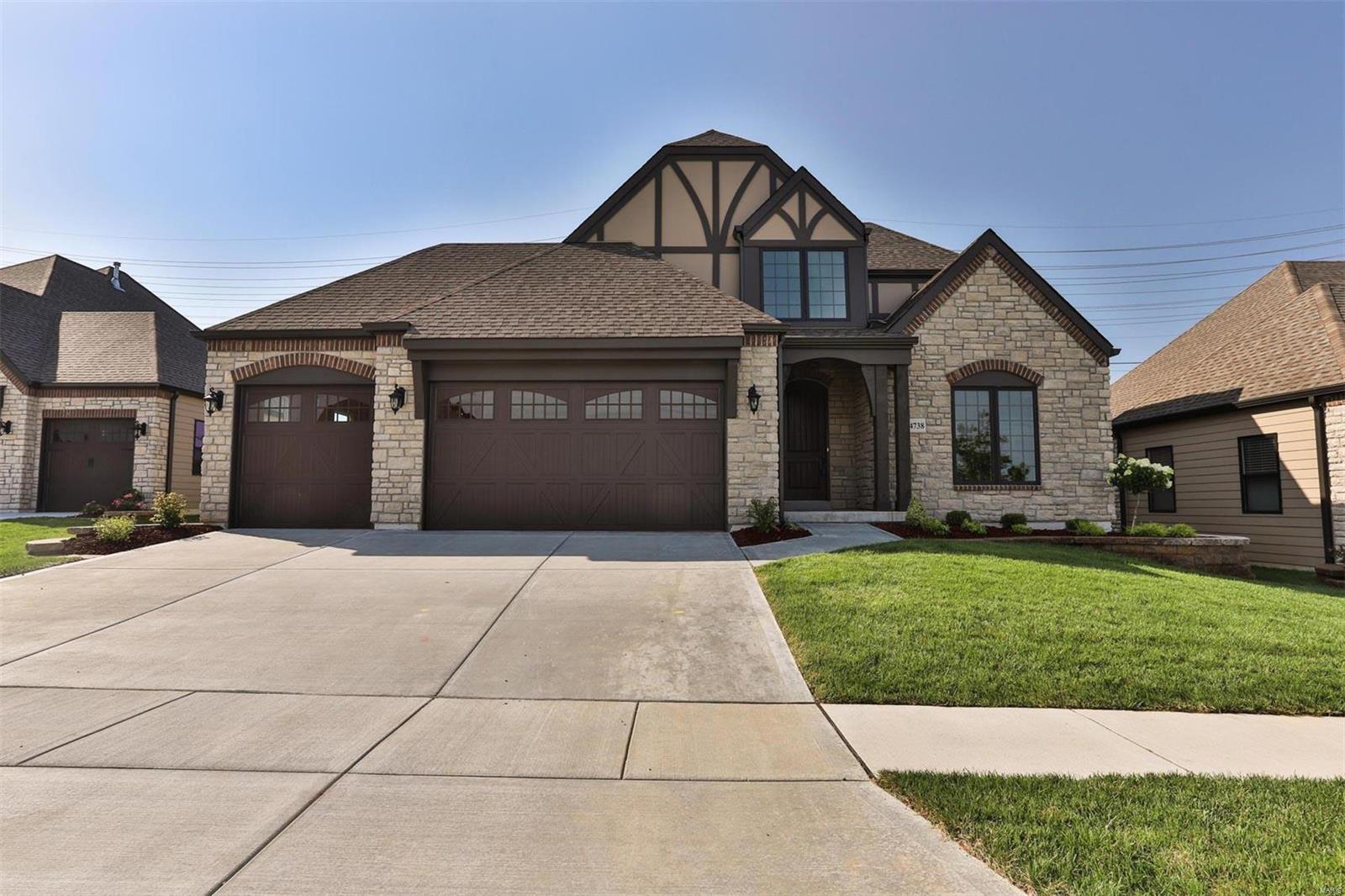 New Construction- JUST COMPLETED!!! Move In Ready! Luxury Low Maintenance Living at its finest! Enjoy a carefree lifestyle and do what you love! This Story & half home features Main Floor Master Suite and Office with Two Bdrms up with full en-suite private baths! Open floor plan w/Great Rm/Brkfast Rm and Large Kitchen with oversized Island. The Kitchen is gorgeous with Designer Upgraded Cabinetry & Quartz Counter Tops included.  Master suite has plenty of storage with a walk in closet.  Master bath features a separate free standing tub and a tile walk in shower w/seat. Secondary Bdrms are oversized and comfortable! Partial Finished Basement includes a Rec Rm, Bedrm, and Full Bathrm. It has the added benefit of Lawn & Landscaping Maintenance, in ground sprinkler system, & snow removal. Easy access to schools, shopping & freeways! Come by & see!