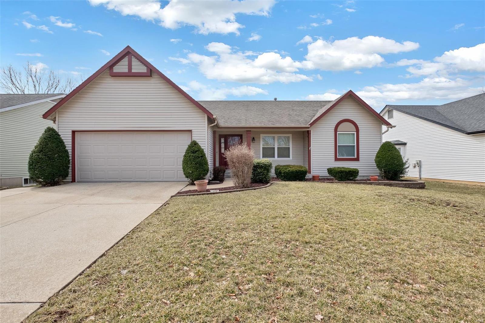 Charming and spacious ranch offering an open floor plan in the heart of St Peters.  This home has excellent curb appeal during the spring & summer months with low maintenance landscaping.  The entry foyer features hardwood floors and leads you into the vaulted living room with a wood burning fireplace.  Attached to the living room is a dining area which flows into the kitchen.  The kitchen has a nice bay window flooding with light and a pantry.  Out back, you will find a covered deck & a patio leading you to the level and fenced backyard.  The huge master bedroom with a walk-in closet features an en-suite with a double vanity, tub and separate shower.  There are two more decently sized bedrooms, a full bath and a main floor laundry to round out the main floor.  The finished lower level is an entertainer's dream with an oversized recreational area, wet bar and pool table that comes with the home!  There is also a sleeping area and a half bath in the lower level.