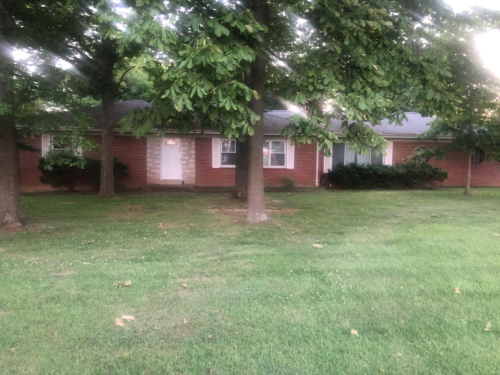 You won't find a lot this size anywhere.  Sitting on .8 acres, this 2 bedroom home, 1500 sq. ft. ranch is ready for your touches!  Prime location accross from Costcos and close to everything you need.  Home built in 1957.  Selling as-is this deal won't last!