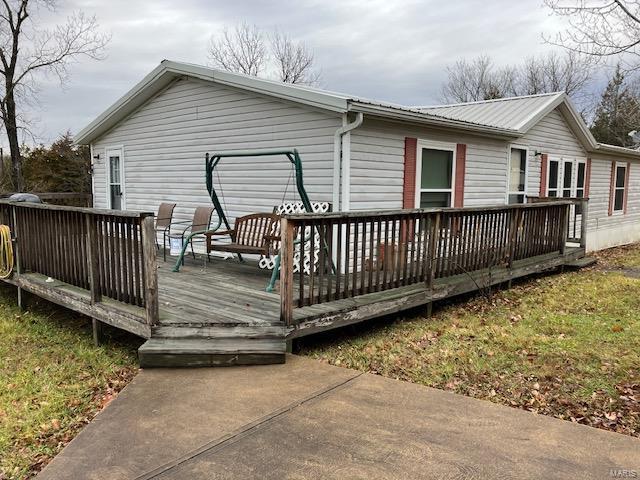 Modular home has two tax I. Ds 0.7 acres and 2.4 acres. Modular home has 3 bedrooms 2 baths and an oversized garage with concrete parking.