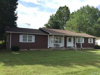 GREAT LOCATION  !!  THIS LOVELY  4 BEDROOM 1.5 BATH HOME IS ON A CORNER LOT  WITH A CHAIN LINK FENCED YARD WITH A STORAGE SHED.  THIS HOME OFFERS TWO LIVING AREAS, A 2 CAR GARAGE, THIS IS A  VERY WELL CARED FOR HOME.