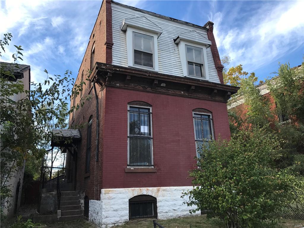 Brick two story with mansard roof; features hardwood floors, fireplace and full basement.  As-Is sale: Buyer may obtain inspections, but no inspections or repairs to be provided by the seller. Pre-Approval letter or Proof of Funds required. Sale addendum and earnest money as certified funds will be required for final acceptance. Earnest money held by the seller's title company. This property is eligible under the Freddie Mac First Look Initiative through 11/27/2017: only owner-occupants for the first 20 days of active listing. *Seller will not complete any repairs to the subject property, either lender or buyer requested. The property is sold in as is condition. SpecialListingConditions: Foreclosure