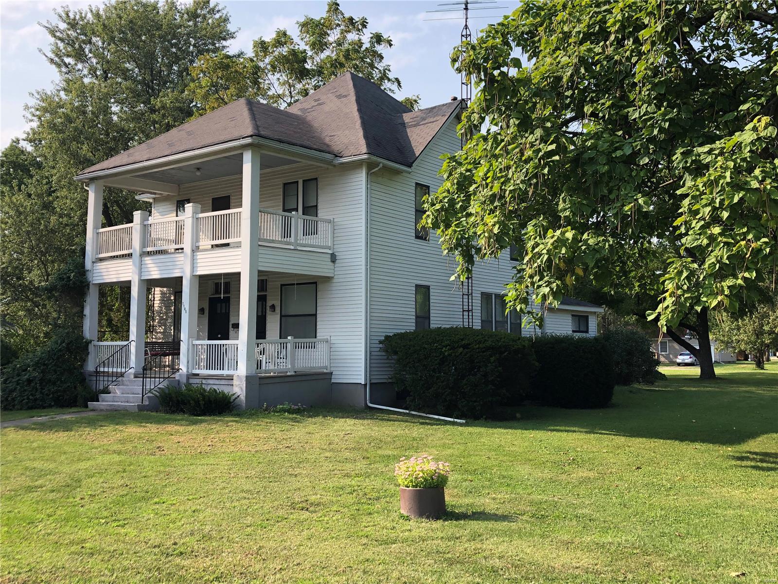 Southern Charm in Pike County! This home has been in the family for 3 generations and is available for public offering. Home sits on 4 city lots w/mature trees and garden shed. Main floor features living room with fireplace(non functional), sitting room w/staircase w/large pocket door, formal dining, kitchen, laundry, and full bedroom w/full bath with large closet. Upstairs offers 4 rooms, full bath & covered balcony. Home has full basement with sump pump. Updates to the home includes: blown in insulation, furnace in 2010, hot water heater in 2013, new water line from street in 2021, updated electric box, several updates on plumbing and electrical fixtures and much more. This home and property has lots to offer in this country setting. Sit on the covered front porch and relax. Home & improvements sell in "AS IS" condition, sellers to make no repairs. Selling to settle the estate, closing to take place at Pike County Title.