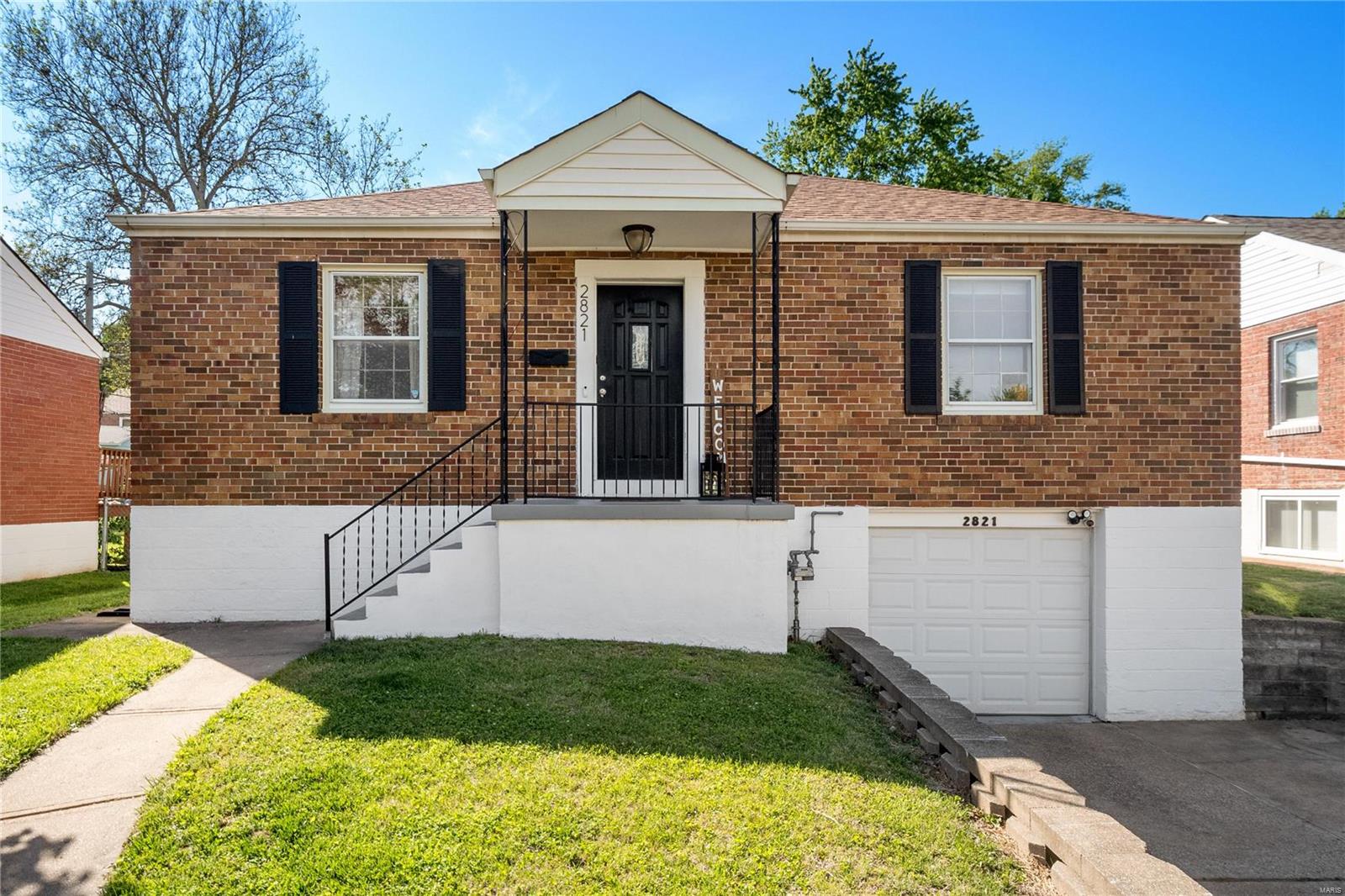 Welcome home to this beautiful brick ranch home!. As you enter the large Living room you are beautiful hardwood floors greet you. Hardwood flooring continues into Dining room which is open to the Living room allowing more space for family and friends to gather. Both bedrooms feature hardwood floors and ceiling fans. Off Kitchen door leads to the large, fenced and level back yard. The one car tuck under garage has plenty of room for your car and storage. Plus additional storage in the basement. Driveway is oversized for additional parking. Home is nestled on a quiet street but close to highways, shopping and more.