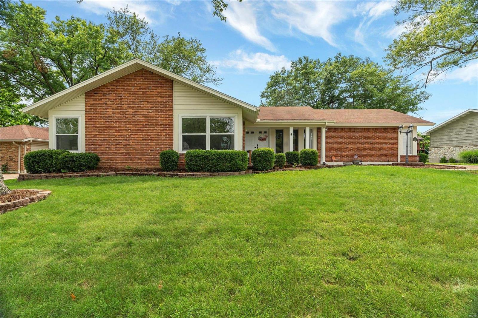 Gorgeous 4 bedroom home in an amazing location close to everything! As you enter this home you will notice the spacious open floor plan with beautiful hardwood floors through out! The formal dining room offers custom paint and chair rail trim. There is a formal sitting area as well as a family room complete with fireplace! The kitchen features white cabinetry, stainless steel appliances, center island & pantry as well as tile flooring and convenient access to the covered patio! Step outside and enjoy the private backyard with your own swimming pool! The master suite has 2 closets, dual adult height sinks & custom shower tile surround to the ceiling. Three other bedrooms, one with a walk-in closet, on the main floor, have their own full bath to share. Additional living space can be found in the partially finished lower level offering a huge rec-room & bonus room/bedroom with walk-in closet as well as plenty of storage space.