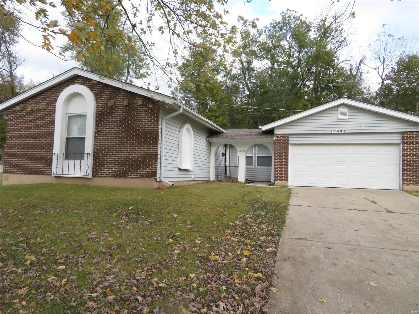 Beautiful remodeled ranch with an open floor plan that sits on a corner lot.  New kitchen with granite counter top, custom cabinets with stainless appliances.  Hardwood floor,  Family room with wood burn fireplace and build in bookshelves.  Master bedroom suite and master bath has a jacuzzi tub and a walk in closet.  A finished basement features huge recreation, games/ siting room, an extract bonus room with a full bath.