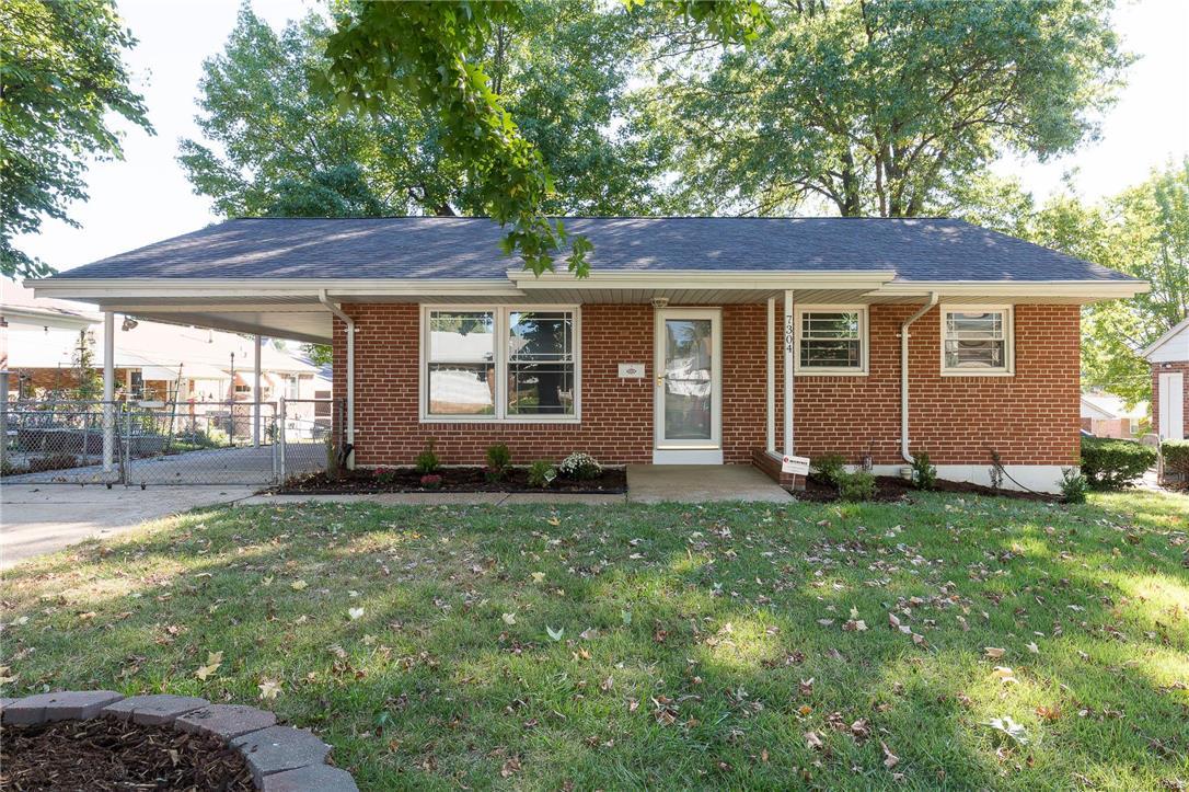 This home has been totally rehabbed with roughly 1663 sq ft of living space.  Some of the highlights include a new furnace and air conditioner, wainscoting, new lights, ceiling fans and six panel doors. When you walk into the kitchen, you will be amazed at the new 42" cabinets, Cambria solid surface countertops, new stove, new dishwasher, and a new microwave. In addition, new large format ceramic flooring has been installed. The main floor bathroom has been completely renovated, including ceramic flooring, ceramic surround in the shower and a new vanity. Fresh paint throughout the home and refurbished hardwood flooring provide the perfect finishing touches. This house also has a beautifully finished basement with new carpeting and a full bathroom.  Believe it or not there is still room for storage in the basement.  When you move in, you will be the envy of the neighborhood!
