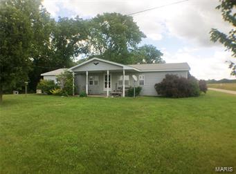 Picture perfect farm with beautiful pastures!  Very nice 80 acre parcel with an older wood barn, corn crib and 3 bedroom ranch home.  Home has a big living/dining room, kitchen/eating with lots of cabinets, nice utility room, 3 bedrooms, 2 full baths plus a bonus space for office/hobby area and 1 car attached garage.  Neat older barn with loft is still in good, usable condition with a workshop area attached.  There are 3 stocked ponds, automatic waterer, loading shoot and mostly pasture that is fenced and cross-fenced.  This is a nice farm ready for you to take over!  Dent-Phelps R-III schools with choice of high school.  Rolla address and not too far from Highway O.