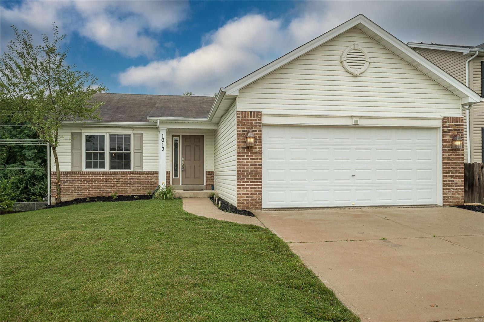 You'll love this 3 bedroom ranch offering 1,360 square feet. Home features great room with vaulted ceilings, main floor laundry, freshly painted throughout, open floor plan and kitchen/dining combo with maple cabinets, upgraded appliances, pantry and access to your low maintenance composite deck overlooking mature trees. The primary bedroom offers two closets and a bathroom with dual sinks and shower only. The unfinished walkout lower level offers rough-in for a bathroom, sump pump and egress window just waiting for your finishing touches. Enjoy the benefits of Homefield with pools, playground, walking trails, pavilions, disc golf and tennis courts.