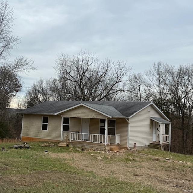 Welcome home to privacy and seclusion.  This home offers over three acres of land that is perfect for that person wanting the private lifestyle without the rules. This home boasts over 1200 square feet of living space and has a full unfinished basement with egress windows, perfect to finish and add additional bedrooms or living space. The home has a eat in kitchen with a breakfast bar and plenty of cabinet space. The living room has expanded windows that allows ample lighting. The primary bedroom features an ensuite private bathroom, and the additional two bedrooms are larger in size and have a private hall bathroom. Relax on the deck while taking in the sights and sounds of nature.  You will not want to miss this home. SpecialListingConditions: Foreclosure