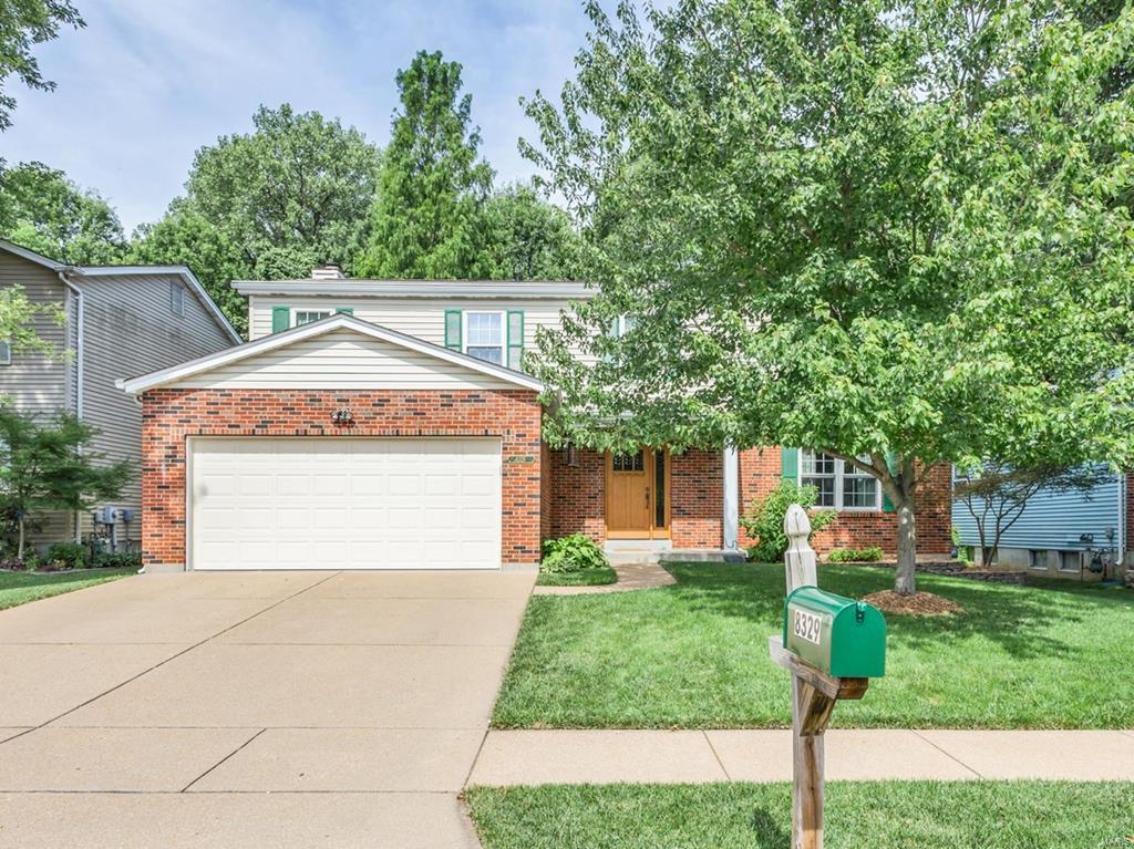 Charming and beautifully updated throughout! This 4 BR, 2.5 bath home offers more than 2500 sf of living space; Beautiful wide-plank hardwood floors grace the main floor; Dining Room features dentil molding; Amazing Kitchen loaded with beautiful custom cabinetry that features glass fronts, crown molding, in-cabinet & under-cabinet lighting; Kitchen also features an functionally chic farmhouse sink, stainless steel appliances, quartz counters, stone tile backsplash and a center island with butcher-block top; Hearth Room with wainscoting, bay window and woodburning fireplace; The main floor is completed by a sunroom,  a large laundry room and a powder room; Master Bedroom Suite features hardwood flooring, walk-in closet and spacious bath with double bowl vanity, large shower and jetted tub; Three additional bedrooms, all with walk-in closets and a second full bath complete the upper level; Partially fenced yard with patio backs to trees; triple pane windows; 2-10 Home Protection Plan Additional Rooms: Mud Room, Sun Room