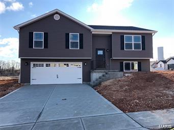 BRAND NEW home with every option you could imagine! They include vaulted ceilings, rounded “bullnose” corners, granite or quartz countertops, stainless steel appliances, 42" cabinets with "cushion close", custom neutral-colored paint job throughout, LVT flooring throughout most of the home, framed windows, taller baseboards, adult-sized cabinets in bathrooms with marble countertops, walk-in closets, upgraded carriage garage doors with openers, full bath rough-in, panel doors (many varieties), and upgraded water/light fixtures throughout the house! MAIN FLOOR laundry (in most models)! Fully sodded yard (front/sides/back). *Pictures are of previously built homes. This home is USDA eligible.