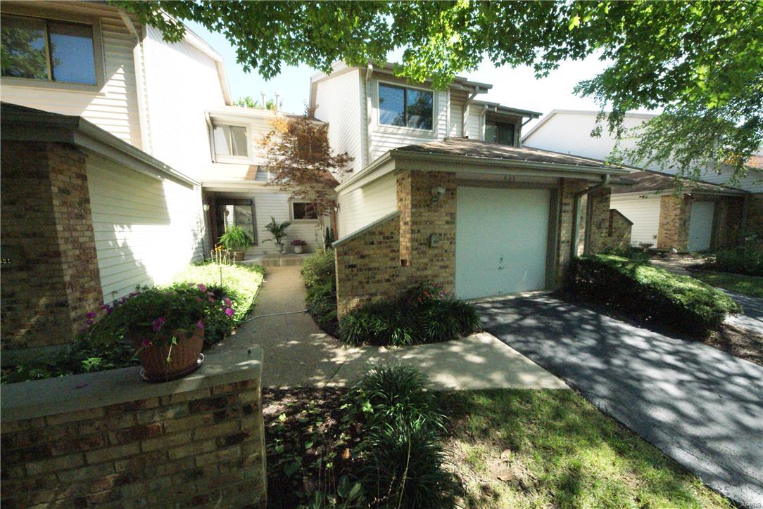 Absolutely GORGEOUS!!! Updated 3 Bedroom & 2 ½ Bath Townhome in Treetop. Look no further! Make your way up the landscaped walk to the front door.  Beautiful, Updated Kitchen w/Granite Countertops, Custom Cabinets, Stainless Steel Appliances & Exquisite Textured Ceiling. The Living Room has a Woodburning Fireplace w/Gas Starter & Wood Floors. The Skylight spills light onto the Open Stairway & into the Dining Area & Living Room w/Gleaming Wood Floors. Plenty of Outdoor Living Space! There’s a Roomy Deck off the Living Room & the Professionally Finished Lower Level -with Full Bath– leads out to a Fenced Backyard Area with Patio. All Bathrooms have been Updated. The Skylights over the Staircase lets in Natural Light and leads up to the 3 /bedrooms and Full Bath upstairs. Windows, furnace & AC have been replaced in 2011 & 2014. Gas Budget Billing=$70 p/m, Electric= $60 p/m. Painted in '16. Community has 2 pools, clubhouse & several park areas. Treetop has NEVER had a special assessment! Location: Interior Unit