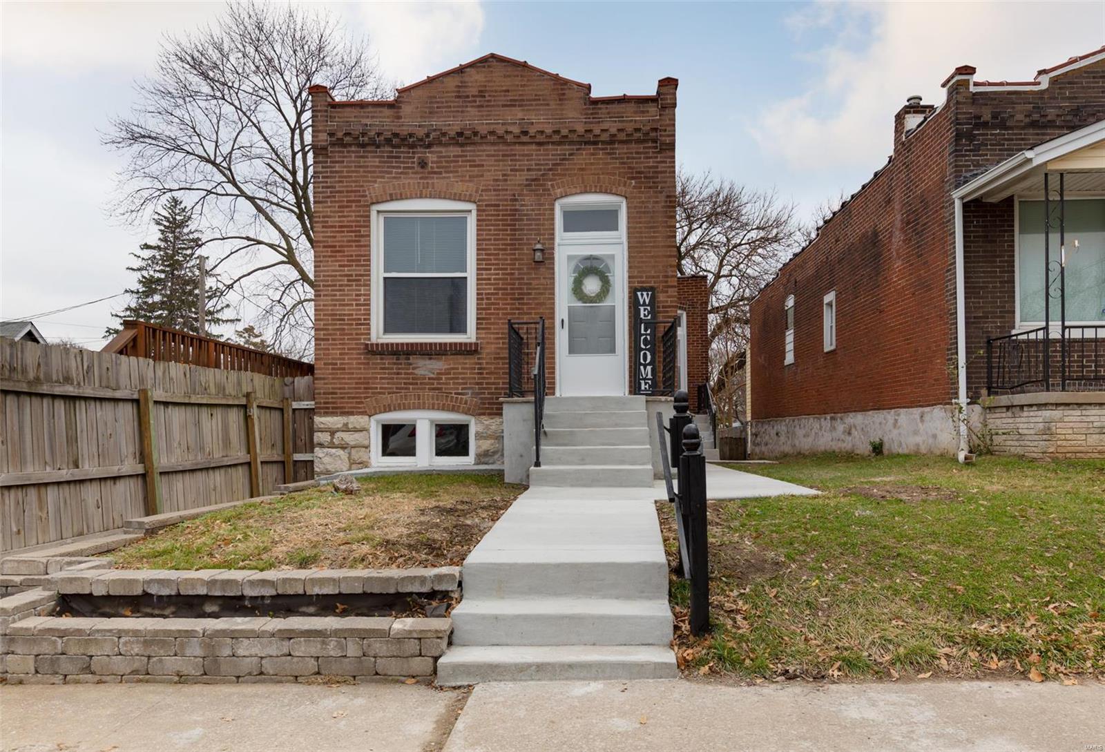 This Lindenwood Park bungalow is simply put-CUTE. Nothing left to do here but to enjoy a low maintenance adorable home. It's a cheerful little guy too! Walk-in & note the popular open floor plan.  All guests will feel included. Mingle, cook & watch TV together (6 feet apart of coarse!). Kitchen has all the bells & whistles: solid counters, white subway tile, white cabinets & a center island! Perfect for the chef! In the rear-2 nice sized bedrooms. This home is ideal for someone who just does not want to fuss with lots of driving, a commuter or someone who comes & goes often. Maybe even a biker-the basement walkout is on ground level! Easy access to anywhere. Greenway bike path access is just a few blocks away! Downtown Maplewood just over bridge-Schlafly's. EASY access to 44 :0)  & just a few min. to 40/64. Yard is plenty big, 2 patio areas for one summer &  one for winter. Your furry friend will love the yard. Plenty of room for garden. All this for $150k-sweet!