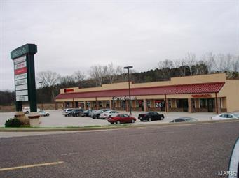 Great Opportunity Here! Nearly 13,000 sq ft retail center on 2+ acres just off busy Hwy 47. Units start at 1200 sq ft.  Currently 1 unit available at $10/sf + $3/sf CAM (includes trash and exterior maintenance).  Call for further details and see how to add this investment to your portfolio today! Location: City, High Traffic, Retail Center