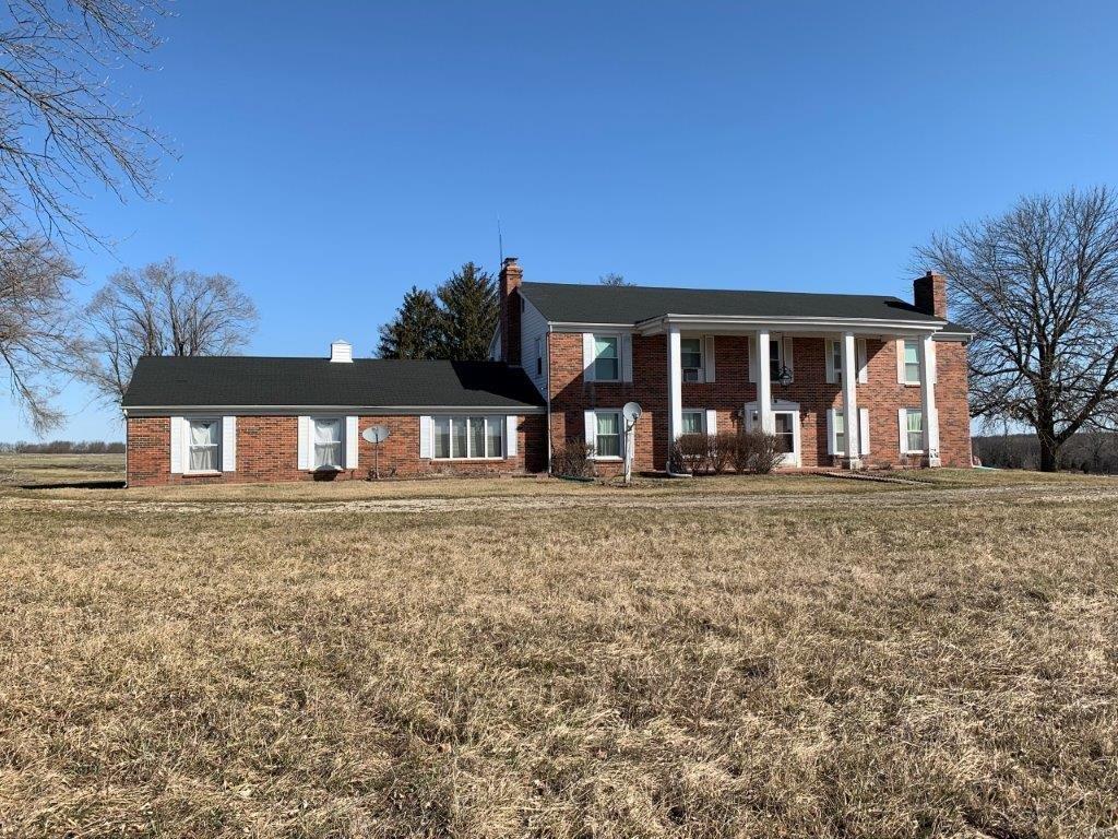 Beautiful estate with over 1600 feet of blacktop frontage and running 3/4 of a mile deep, this property is a great investment opportunity priced at $10,800.  Rolling creek, hidden meadows, buildings suitable for horses, livestock and equipment, fenced pasture, stately two story home (in need of repair) this place has it all. Approximately 100 acres of fenced pasture!  Great place to run cattle and horses on the front and hunt and ride four wheelers in the back. Pipeline easement thru property.  Just 5 miles south of 70.