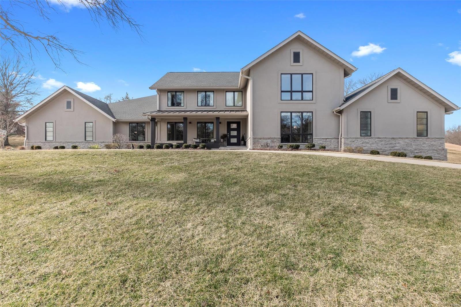 Luxury abounds in this completely renovated 1.5 story home. Every detail has been thoughtfully attended to from the heated 4 car garage w/charging station to home automation. Kitchen has Omega weighted self closing cabinets, Miele 6 burner dual fuel range w/grill plate, prep area w/sink, dual dishwashers, large island, & banquette. Laundry room has dual pantries, dog washing station, folding station, & access to the deck. Dual master bedrooms giving you the flexibility for a home office, nanny quarters, or generational living. Main floor master suite has custom designer dream closet, heated bathroom floors & towel bar, soaking tub, & some accessible features such as roll in shower. Included upstairs: 2nd master suite, 3 additional bedrooms, 3 full baths, & loft/study area. LL is finished w/home theater, game room, full bath, playroom, & kitchenette. Fenced backyard has a retractable screen room & grilling station. Home sides to the golf course & is steps from Forest Hills country club. Some Accessible Features Additional Rooms: Mud Room