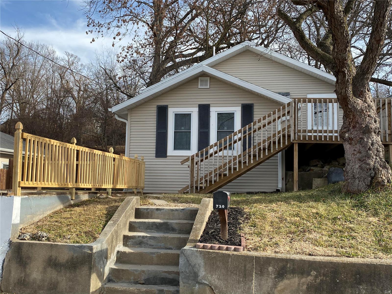 ***Available again due to no fault of seller***ABSOLUTELY ADORABLE!  You cannot believe the use of space in this two bedroom one bath property.  No detail was left undone.  Completely remodeled with all new electrical, plumbing, windows, kitchen, flooring, ceiling, insulation, updated bathroom, exterior siding, gutters, shutters.  Partial basement offers wonderful storage and offers laundry connection and half bath.  Property could be sold with furnishings!  Back yard offers potential for a BBQ area! Call today!