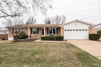 Welcome Home to this Meticulously Maintained full brick ranch home which offers vaulted ceilings, open floor plan, cozy fireplace and tons of natural lighting throughout.  You will love this home inside and out!  Master suite is large with its own full bath and large walk in closet with California organizing system.  Secondary bedroom is spacious and bright.  3rd Bedroom on main level is currently beings used as a home office but in earlier years was used as formal dining-room.  The lower level is massive and offers an additional family room, 2 large finished rooms that could be used as office or additional sleeping area’s (no egress window but both have large closets.) Newer windows, HVAC, water heater and dishwasher. Outside offers an awesome covered patio with privacy and fan.  Yard is large, fenced and landscaped very nicely including waterfall and pond area. So much PEACEFUL outside space...you will not want to miss this one!!