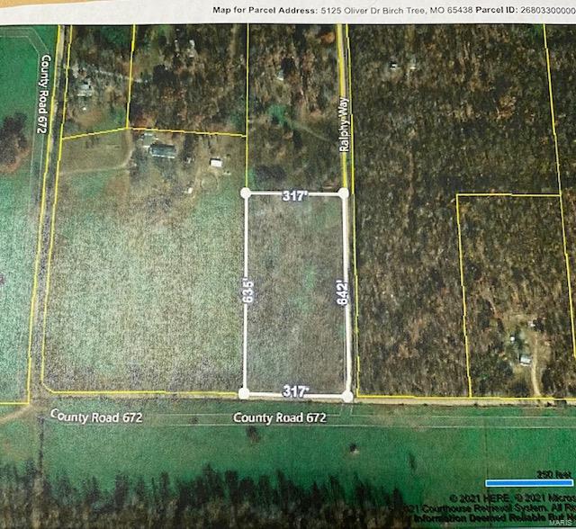 Located in Birch Tree, MO about two miles down a gravel road - 5 acres m/l with pond, electric, well and septic. Needs a good brush hogging. No restrictions.