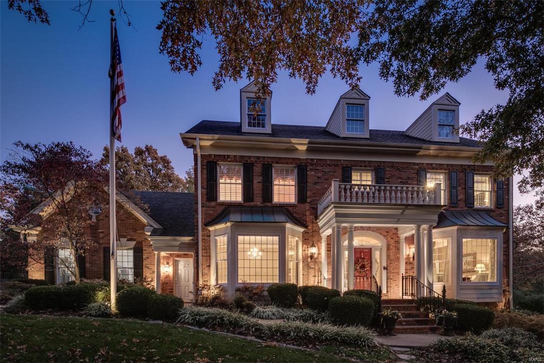 Open Sunday, Nov. 12th from 1-3. Here's your chance to have this beautifully renovated 2-story (last home on the street)backing up to Tilles Park! Spectacular screen porch w/Ipe floor (Brazilian hardwood),bead board ceiling w/speakers, Heat n Glo gas fireplace w/ stone surround, custom oversized screens, azek rails;looks out to the professionally landscaped backyard...truly an oasis w/gorgeous perennials, stone work, & gate to quiet side of Tilles. Master suite w/ huge walk-in closet and NEW top of the line bath (Mitchell Wall designed and McMillian built). No expense spared! Arched breakfast room w/ palladian windows off gourmet kitchen (w/new high-end stainless appliances), opens to hearth room w/box beam ceilings, built-ins flanking the fireplace and wet bar. Great flow... open floor plan and flooded with light!  Finished lower level with another fireplace (3rd), several entertaining spaces, full wood-paneled bar (ice maker, dishwasher, fridge), gym, & full bath...all renovated!