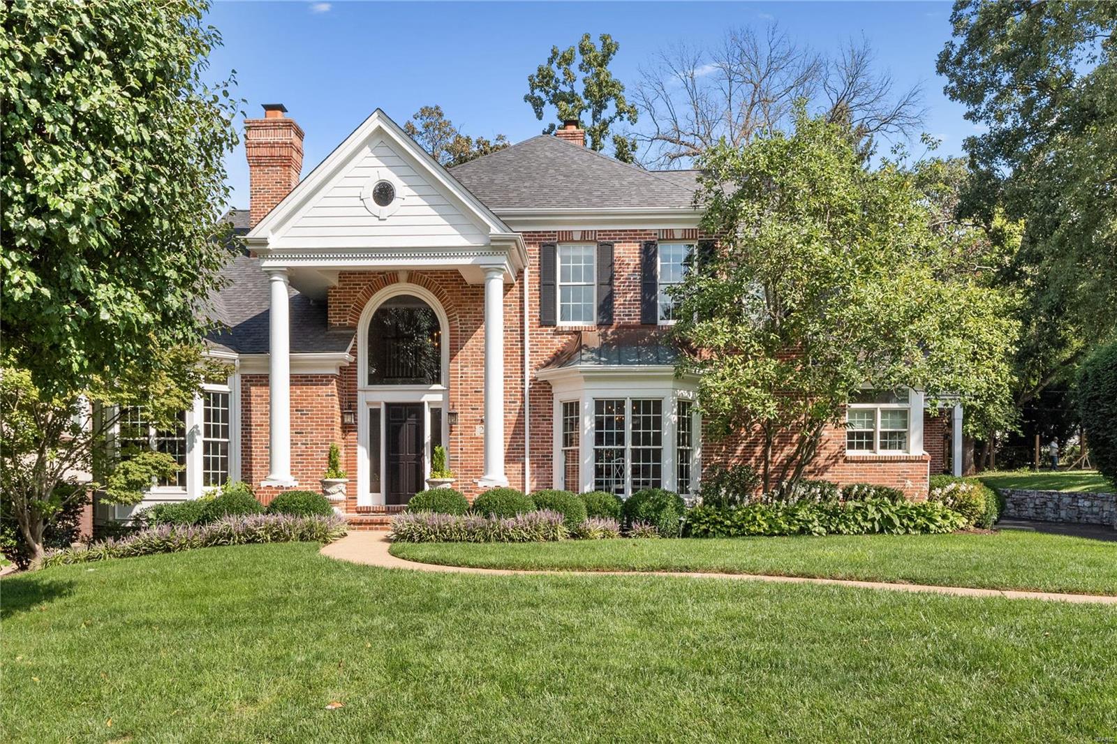 Unbelievable New Price $$$  Fresh new staging and freshened up thru-out. This blissful setting will attract buyers of every age group! Conveniently located in charming Deer Creek Woods. Attractive & Sophisticated 1.5 Story. Welcoming entry foyer w/rich tones & natural flow into Dining Room & a main floor office off the Main floor owner's Suite w/ fireplace. Elegant owner's suite Updated bath w/ spectacular chandelier & large walk-in shower. Lovely updated eat-in kitchen w/ spacious hearth rm. Main floor boasts high ceilings & comfortable atmosphere. Upstairs features 3 quality bedrooms, 1 ensuite & one jack & jill bath. Lower level is a beautifully appointed space for entertaining w/ large family rm plus extra bedroom & full bath. Main floor laundry & 3 car side entry garage. Private & serene level backyard w/ landscaped patio. 2 zoned HVAC replaced in 2016. Roof Replaced in 2013. Newer carpet & rich hardwoods throughout! Great Value in Reed/Ladue Schools. Enjoy Tilles Park.