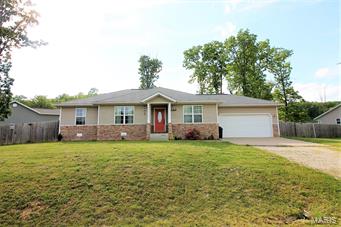 Come one, come all and check out this cute 3 bedroom 2 bath home with great flat, privacy fenced yard!  stepping in to this home you will note the new laminate flooring and large open living that looks into the dining area with breakfast bar into the kitchen which offers new appliance package (Black Stainless steel)!!  Looking out into the back yard you will see it is FLAT with both a deck and patio, great for entertaining.  The 3 bedrooms located down the hall are carpeted for comfort and the master is sized great for a King Size bed and dressers.  The master bath offers double high-rise vanity, jetted tub and shower! With Close proximity to FLW this is a great home to call your Next Home!!