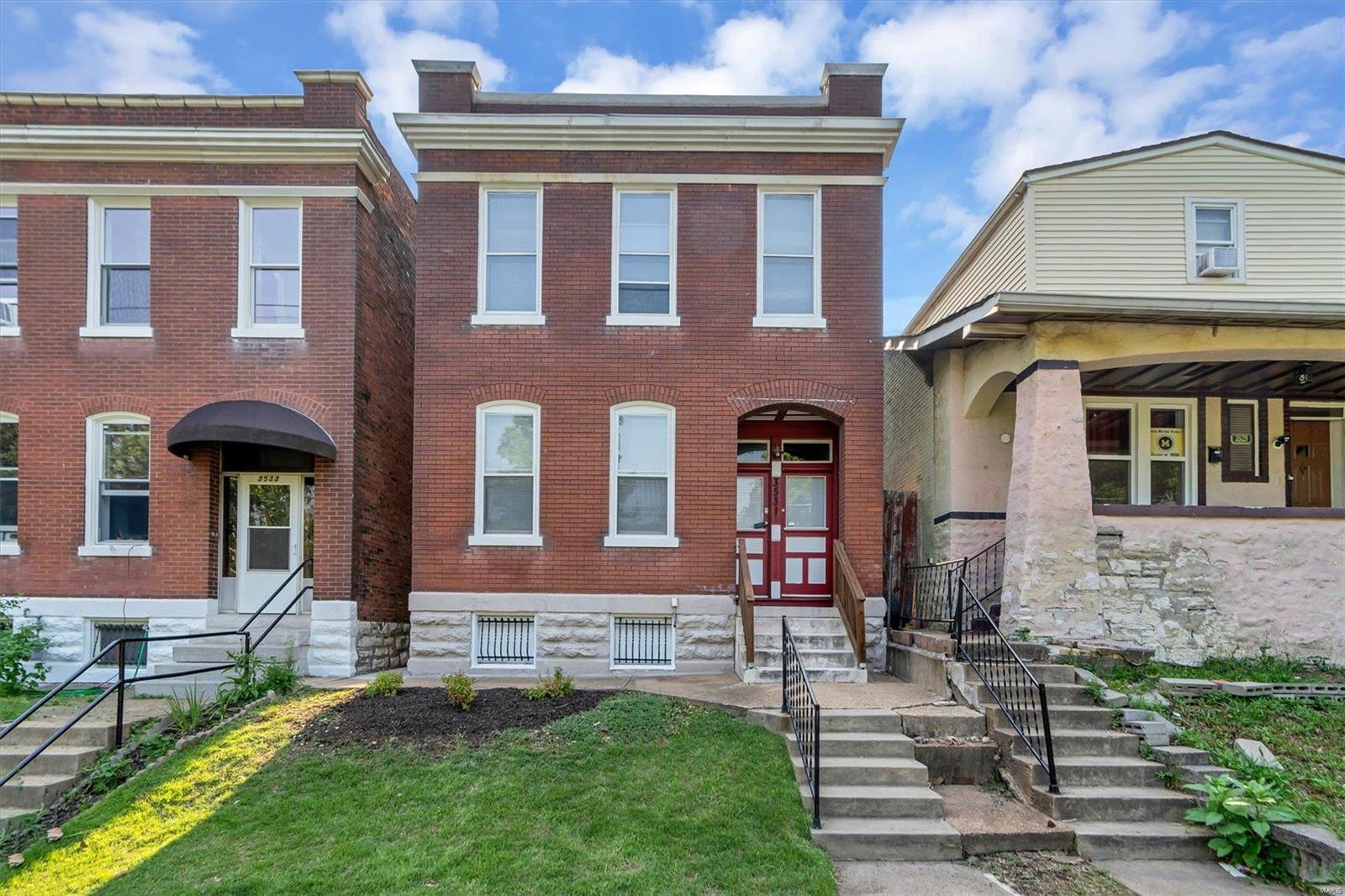 Check out this newly renovated 2-family that has been converted into a single-family home. This spacious 3 bed/2 bath home is just steps away from Gravois Park. The modern mix of wood floors and carpet throughout adds comfort and class. In the kitchen you'll find gorgeous white cabinetry, granite countertops, and all new kitchen appliances with a separate dining room. Balcony overlooks large, level fenced backyard. You'll fall in love with all the updates including the rooms/bathrooms, major appliances, flooring, and more.  LL provides plenty of storage. Walking distance to all the amazing shops and restaurants on Cherokee Street! This is city living at its best!
