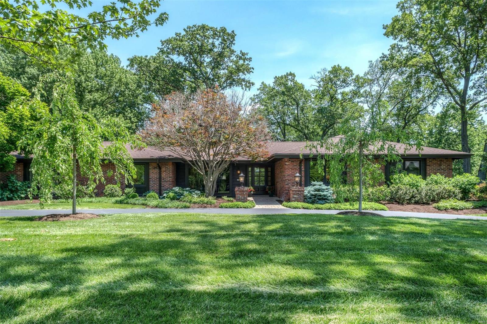 Wonderful transitional ranch in sought after Runnymede has been totally renovated with over 4,000 sq. ft. of living space.  4B/2.5Ba on main floor with a fabulous finished lower level with another bed, full bath and huge family room make this home a dream.  Recent updates include new designer master bath, carpet, lighting, painting, new windows and roof, foyer and front door, main floor laundry/mud room and half bath plus so much more!!  The floor plan offers great flow for entertaining and everyday living.  The backyard and terrace is private with lush landscaping, hot tub, sprinkler system.  Circular drive, oversized rear entry garage, gleaming hardwood floors in all living spaces, renovated kitchen, marble surround fireplace and freshly painted walls in neutral palette, make this ready to move in!! Great location near medical facilities, highways, restaurants and parks…..