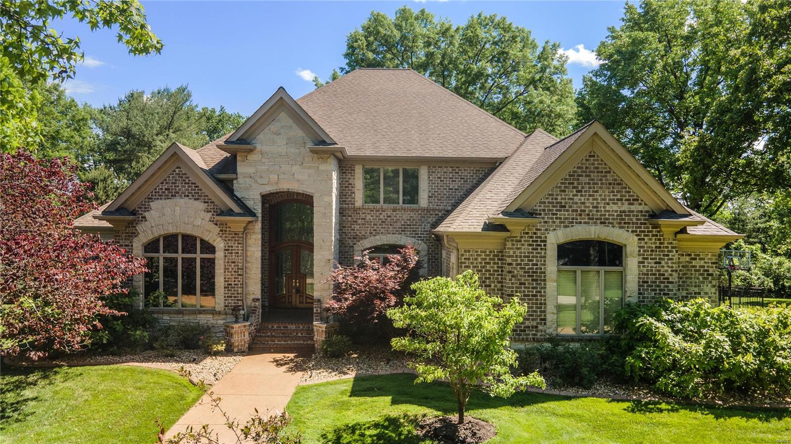 22 Walling is an impeccably-crafted residence spanning about 6,600sqft of thoughtful living and entertaining spaces. Impressive from the moment you walk in the door, the entryway is flanked by a private office and dining room and leads to a soaring, two-story great room which serves as the centerpiece of the home. Feed all your family and friends in your new kitchen and hearth room, adorned with the finest finishes and boasting a magnificent, floor-to-ceiling stone-surround fireplace. When entertaining gets old, escape to the private primary suite with opulent bath and large closet. Sweeping views of the backyard and exceptional molding and architectural details throughout. Upstairs, another bedroom suite and 2 addl bedrooms and jack-and-jill bath. LL offers unparalleled entertainment opportunities with a spacious rec room, outdoor access, bar/wine room, home theater, fitness space, and an extra bedroom with full bath. 3 car garage, located close highways, schools, hospitals, and more. Additional Rooms: Mud Room, Wine Cellar