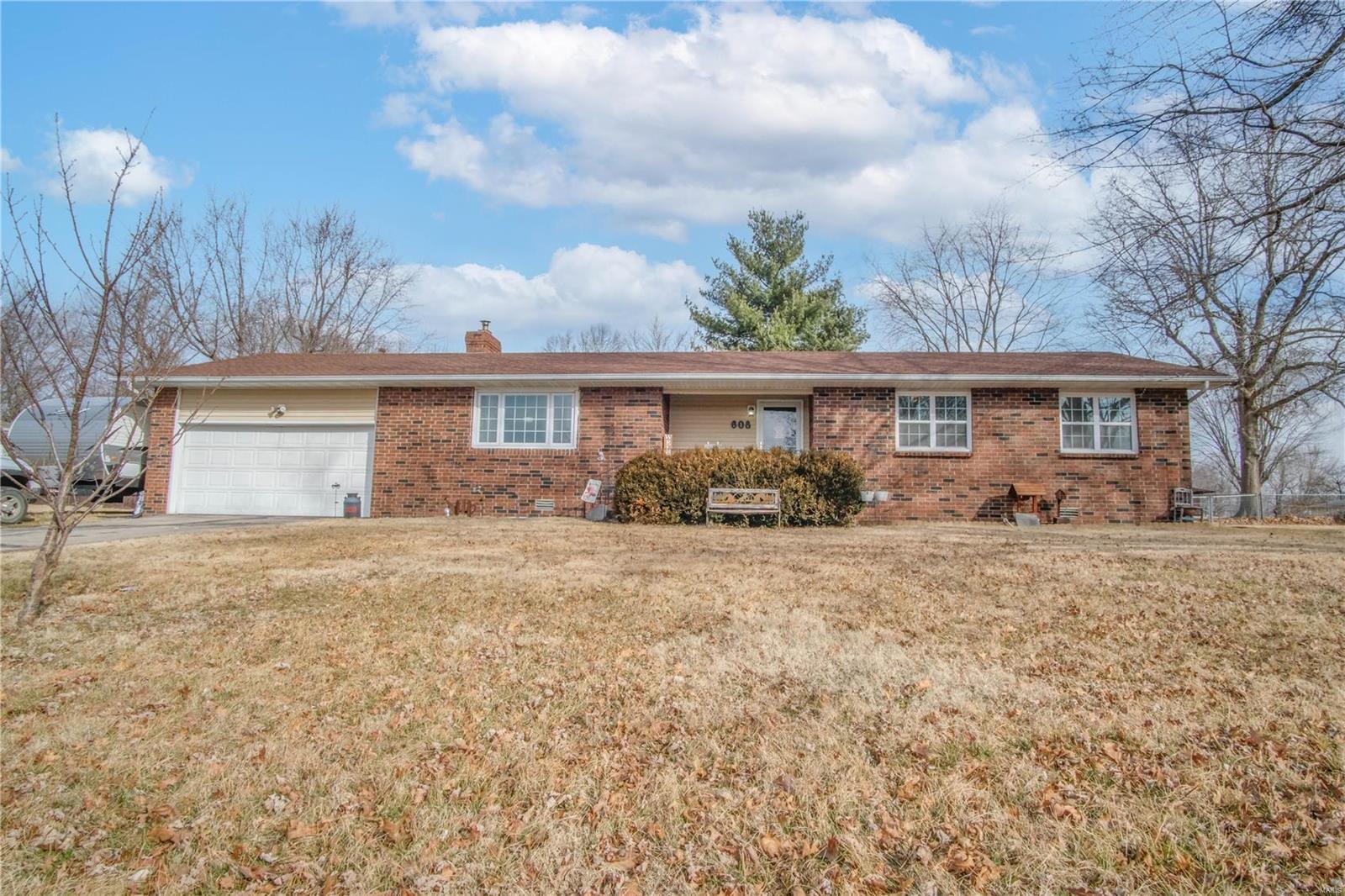 This wonderful 3 bed 2 bath home is sure to tick all of your must have boxes from the welcoming front porch to the 1/2 acre lot that it sits on. Stepping into the formal entry, you have the large living room which is flooded with natural light to the left and the open concept kitchen, dining room, family/hearth room straight ahead. The kitchen boasts freshly updated cabinets and backsplash, breakfast bar, & all major appliances, while the family/hearth room is perfect for cozying up next to the fireplace insert & reading a book or visiting with the chef of the day while a meal is being prepared. The large utility room offers tons of extra storage as you come inside from the 2 car garage. Down the hall are 2 guest rooms and double vanity guest bath along with the master suite with it's full bath. Through the dining room patio doors is a wonderful sun porch overlooking the expansive, fenced backyard with towering trees & wonderful patio area. This home is priced to sell - so call today! Additional Rooms: Sun Room