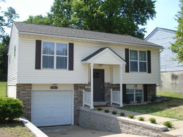 Beautiful home located in desirable Dogtown area. Minutes away from Forest Park, the Zoo, restaurants, night life and shopping.  3 Bedrooms and 2 full bathrooms! Lots of nice updates. Large updated kitchen with granite countertops ( all appliances are stay) Two upstairs bedrooms with ceiling fans and large master bedroom suite on lower level with walk in closet, both bathrooms boasts ceramic tile flooring and granite countertops. Large patio and fenced in backyard ideal for grilling with friends or just for the pets or kids to play. Large garage with ample room for storage. Additional insulation added around skylight 2015, New AC 2015, new dishwasher 2016, new microwave 2017.  Don't miss your opportunity to live in a wonderful neighborhood!