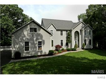 Welcome home to this incredible 1.5 story home w/6 beds & 6 baths. Situated on nearly 4 acres of total privacy, this home w/ approx. 6,000 sf of living space is perfect for quiet evenings or entertaining w/family & friends. The 2 story entry foyer flows to the great room w/wall of windows overlooking inground pool. The kit. w/42" cabinets, granite counters, center island & stainless steel appliances is a chefs delight.  Master bed/bath w/cathedral ceiling offers huge walk-in closets. Main fl. laundry w/half bath. Hardwood floors are found in Living Room, Dining Room & Great Room. Family Room & Screened Porch are just off the Kitchen. Upper Level offers 3 generous sized Bedrooms & 2 Full Baths. Finished walk-out Lower Level features Fitness Room, Billiard & Family room, Wet Bar, Playroom/Nursery, 5th & 6th bedrooms  & Full bath. Security System. 4 Car Garage w/ workshop above Garage. Just minutes from Premium Outlets, Restaurants, I-40/64 & the Chesterfield Valley. AAA Rockwood Schools!