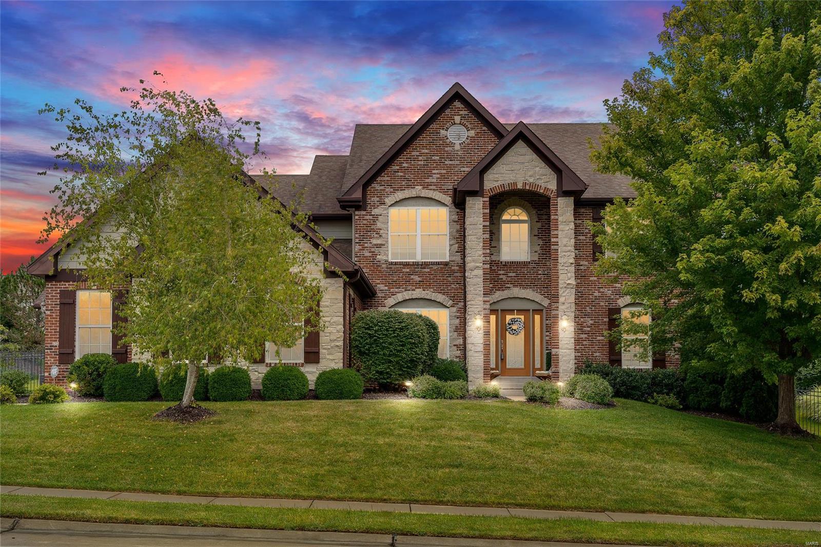 Gorgeous 1.5 story, 5 bed, 6 bath (4 full), with an in-ground pool & great spaces for entertaining. There is an abundance of windows throughout the home which means a lot of great natural sunlight. Other features include: Hardie Board siding, brick/stone ext, side entry 3 car, 9' ceilings on main, 2 sty GR w/impressive wall of windows, gas FP, built-in bookcases, ceiling & crown in DR,  hearth room w/box beamed ceiling, built-in stereo system thru-out main and up in the loft area.  Kitchen features: walk-in pantry, SS appliances, wood flooring, granite, designer back splash & huge center island. Main floor master: his & her closets, frameless shower, jet tub, double sinks w/vanity. Upstairs: 3 beds all w/walk-ins, loft. Huge main floor laundry w/a sink/cabinets. Finished lower w/full bath, bed, bonus room (office?), rec room w/a wet bar & the space off to the side would make the perfect theater room. Large backyard - fenced, level, patio, sprinkler system. The spa tub is included.