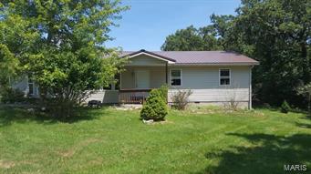 Here is your chance to finish the house of your dreams!!! This home is already framed for a large master suite, 2 large bedrooms, a hall bath and master bathroom, a kitchen and utility room. The home sits on a large flat breathtaking lot and backs up to the woods for a scenic view. All the hard work is done for you this desirable home just needs your fiishing touches!!! Did I mention this home features a metal roof and has a large storage shed for storage. Don't sleep on this steal of a deal!!! Call to schedule your showing now!!!