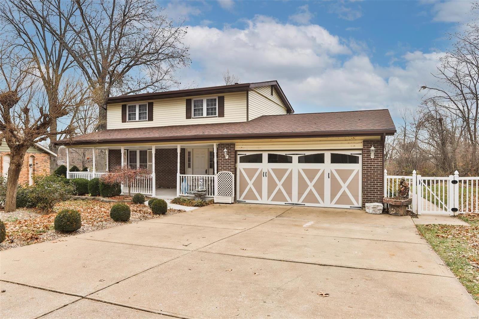 Here it is !!! A 4 bed/ 2.5 bath home with an inground pool! Inviting covered front porch is the perfect spot to sip your morning coffee. Formal living room features wood floors, crown molding and fireplace feature and adjoins your dining room making entertaining a breeze. Eat-in kitchen connects to cozy family room and as well as access to your 3 season room. Upstairs you'll find 4 spacious bedrooms and two full baths. Partially finished walk-out LL has a great rec room, sleeping room or home office and plenty of storage. Enjoy your oversized deck that overlooks inground pool and private fenced, level backyard. Storage shed for all your pool accessories, tools and toys. Oversized two car garage!***Roof 6 years NEW!! HWH 5 years NEW! This home is waiting for your ideas and personal touches to make it your own!