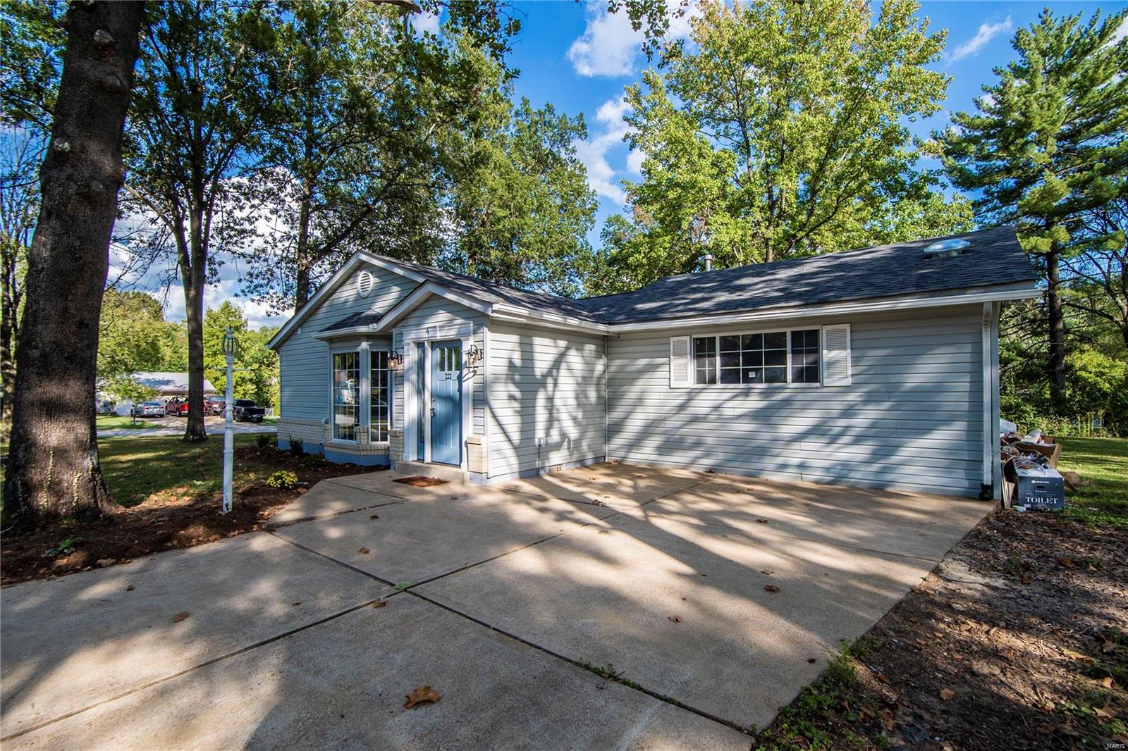 Must see this fully renovated 3 bedroom, 2 bathroom home located  in the highly rated Rockwood Schools District! Open concept floor plan with large living space, dining room, superb kitchen with white soft close cabinets, grade A granite counter top, ceramic tile back splash, breakfast bar and stainless steel appliances including exhaust hood. Master bedroom suite with walk in closet and full bathroom including double vanity, 5 foot wide shower, ceramic tile flooring and mosaic tile shower enclosure. 2 extra bedrooms, study area and beautiful ceramic tile guest bathroom. New exterior doors, all new two panel doors, neutral color laminate flooring, recessed lighting, new plumbing, new 200 amp electrical service, new Lenox HVAC system including new duct work. Architectural shingle roof, double wide driveway, concrete patio house, storage shed, huge 1/2 acre level lot. Home protection plan provided for buyer's peace of mind.