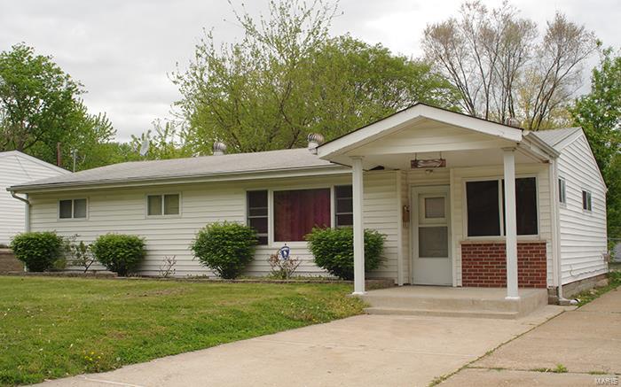 Spacious, starter home/investment property in desirable Woodson Terrace!  
Property is close to the airport, bus routes, and accessible to shopping and restaurants.  
Needs some updating but once you do, you will have a great investment property or starter home!
Features a bonus room; main floor laundry in a spacious kitchen; and double driveway.  
Buyer should verify tax record and schools.