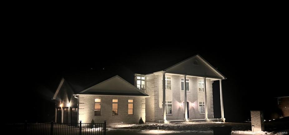 Exquisite all-brick estate with stunning views in Hannibal, MO! Step into luxury with the breathtaking two-story all-brick home, boasting 5,838 sq. ft. of meticulously designed living space across three fully finished levels. With 6 bedrooms & 7.5 bathrooms, this property offers the perfect blend of comfort & elegance. The open floor plan creates a seamless flow, ideal for entertaining. A custom-designed kitchen serves as the heart of the home, offering premium finishes & ample space. Enjoy beautiful views from every room or take in the scenery from the expansive deck. The lower level is an entertainment haven, featuring a media room, family room, & dedicated exercise room to meet all your lifestyle needs. Two primary bedroom suites provide ultimate convenience & luxury, making this home perfect for multigenerational living or hosting guests in style. This rare gem offers unparalleled space, luxury, & functionality in the heart of Hannibal. Don't miss the opportunity to make it yours!