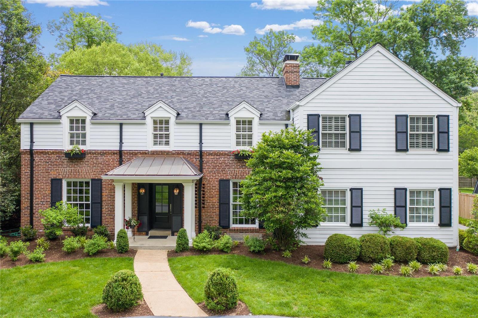Start creating a lifetime of memories on sought after Berkley Lane. This 4800+ sq ft 2 story traditional home has an updated white eat in kitchen w/center island; granite counter tops & SS appliances. Adjoining large family room w/vaulted ceiling & WBFP w/access to partially covered patio & level yard. Dedicated home office/den w/ built in bookshelves. Central DR w/gas FP & built ins. Spacious light filled LR overlooks outdoor living space w/extensive landscaping. Mudroom w/custom cubbies & 2 half baths complete first floor. Upstairs has large vaulted owner retreat w/2 sitting areas, a WBFP & separate custom closets. Ensuite bath has 2 vanities, steam shower, oversized tub & heated floors. 4 add'l bedrooms & two 2 full baths. One bedroom is being used as home gym. 2nd floor laundry w/ storage. Finished LL w/ ½ bath & storage. 2 blocks to Reed School. Close to Clayton & highways. Location can’t be beat. Move in just in time for the traditional Pink Flamingo summer parties. Additional Rooms: Mud Room
