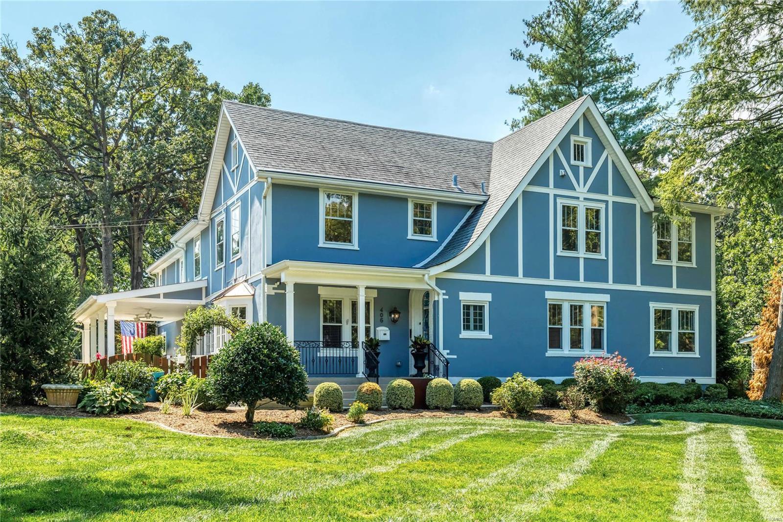 Located in Webster's most desired historic neighborhood, this exceptional 1.5-sty Tudor has been extensively updated throughout while maintaining the charm & character of classic architecture. Tiled porch entrance & artisan stained glass front door lead to hardwood foyer, dining room with wide bay window, butler’s pantry with wet bar & spacious living room. Designer kitchen with marble countertops, premium appliances & 9’ center island adjoins breakfast room with French doors to patio & family room highlighted by marble fireplace. Stained glass double doors open to master bedroom suite with slate fireplace, bookcase & luxury bath with laundry. Oak staircase accesses a 2nd master bedroom suite with marble bath with jetted tub plus 3 additional bedrooms, 1 with sitting room & ensuite bath, hall full bath & convenient laundry. Lower Level includes recreation room & office. Situated on a set-back lot with private courtyard, covered patio & pool & hot tub surrounded by landscaped gardens.