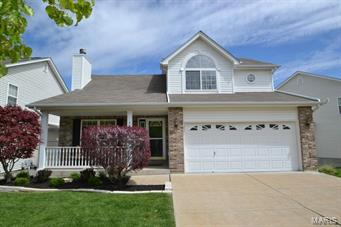 Immaculate and nicely updated 4 bedroom, 3.5 bath 1.5 Story home in a convenient Fenton area!  Gorgeous wood flooring runs through the vaulted greatroom with fireplace. The dining area adjoins the kitchen which features granite counter tops.Porcelain flooring in kitchen and baths. French doors lead to a covered deck overlooking the level backyard. The main floor master suite has bay window, his and hers closets, luxury bathroom with separate tub and shower.  Upstairs you will find an open sitting room area and 2 generous size bedrooms with walk in closets and jack 'n Jill bath.  The finished walk out lower level provides extra living space with a large family room with surround sound, rec room/bar area, 4th bedroom, full bath and storage area. Enjoy the convenience of nearby Gravois Bluffs shopping, highways and schools.